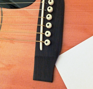 Acoustic guitar bridge parts